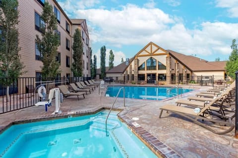 Unwind poolside with loungers and sparkling mountain air.