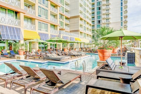 Dive into sun-soaked pool days with plenty of loungers.