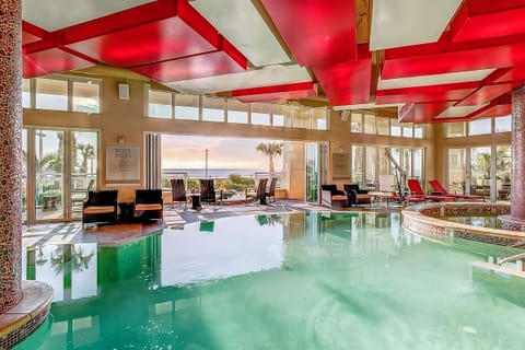 Float in the indoor pool while gazing toward the ocean.