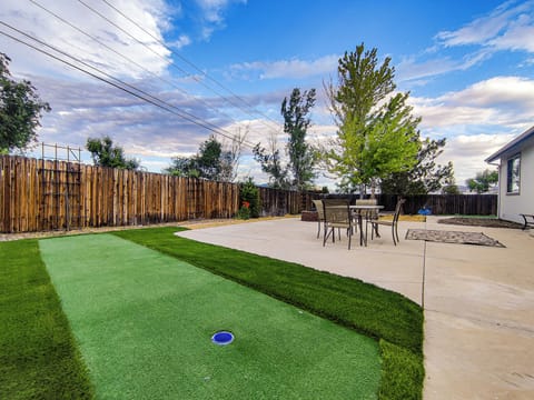 Get your putt on in the backyard just outside the Master bedroom.