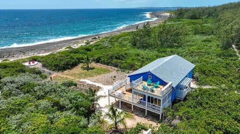 Look at all the outdoor spaces to enjoy! an 18' high rooftop deck, a screened dining porch, and a patio amongst the dune!
