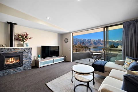 Overlooking living area with a fireplace