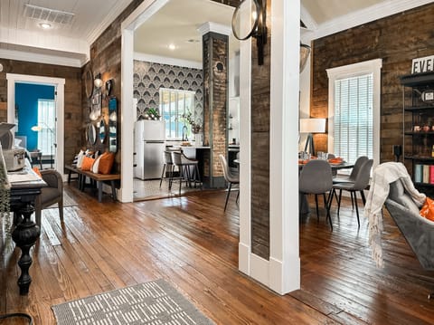 walk on 100 year old floors! The inventive architectural treatment extends to the reimagined "open" hallway!