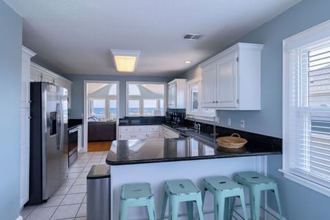 Kitchen Bar - From either end of the kitchen, you can pull up a stool and a meal or the view.