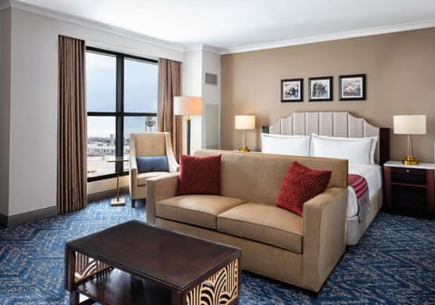 Relax on the sofa and savor sweeping city views.