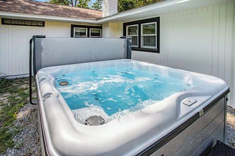 Unwind in our hot tub, the perfect spot to relax after a day of adventures.