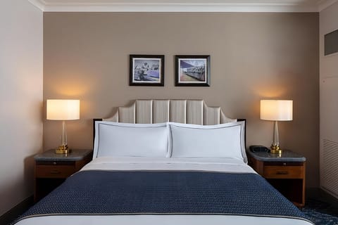 Drift off fast in crisp linens and calming bedside glow.