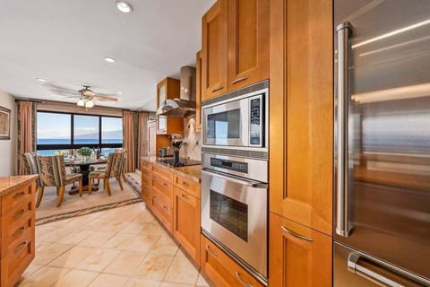 Cook with ease in a fully equipped kitchen featuring premium appliances.