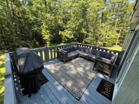 Cozy deck with grill and couch
