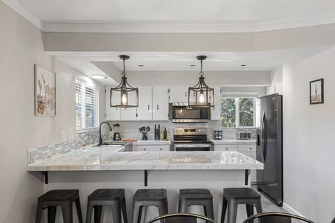 Upgrade your cooking game in style in our contemporary kitchen.