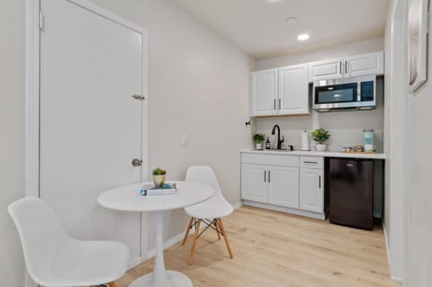 Newly renovated kitchen with all new appliances and dining area for 2.