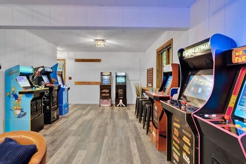 Arcade Game Room with Multiple Machines & Entertainment Space