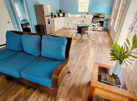 Plenty of sunny space overlooking deck and tropical vegetation.