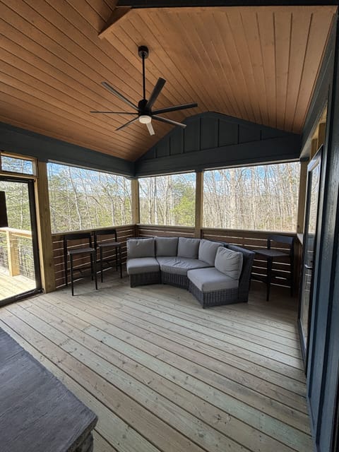 Screened in porch with fan & wood burning fireplace!