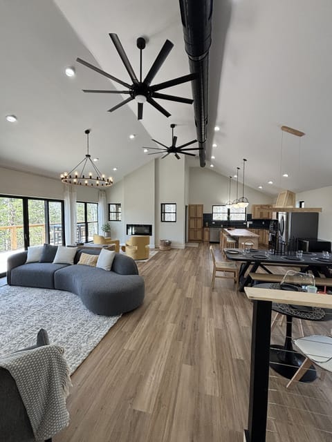 Great room on top floor with full wall of windows to enjoy the view of the lake