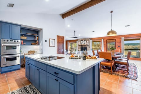 Updated kitchen with large island with dining for 4