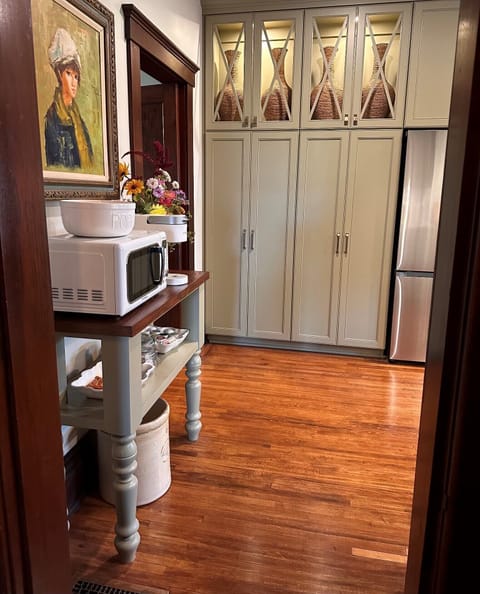 Complete Kitchen Redesign and Updating with Custom Made and Painted Cabinetry