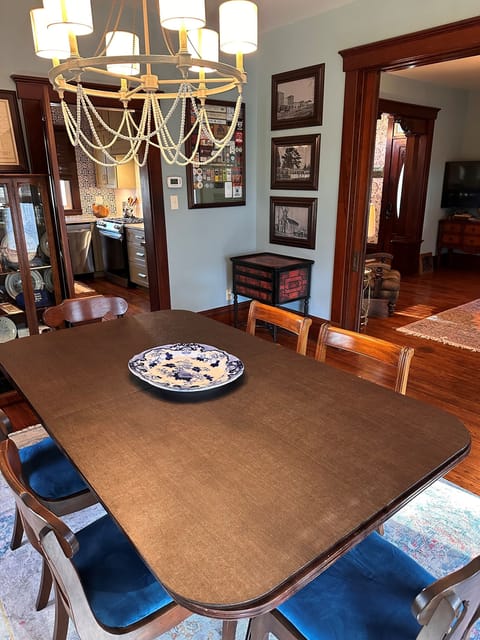 Dining Room Views into Kitchen and Living Room Areas