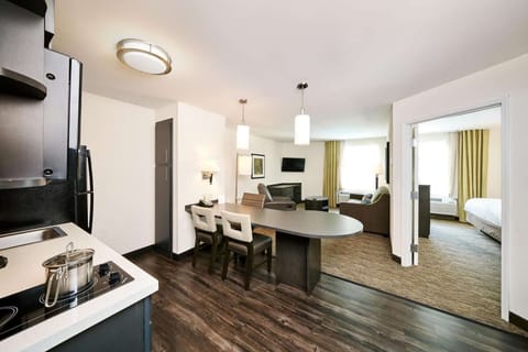 Gather for easy meals with kitchenette, dining table, and lounge.