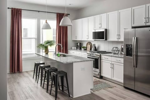 Stocked kitchen with all the cooking utensils