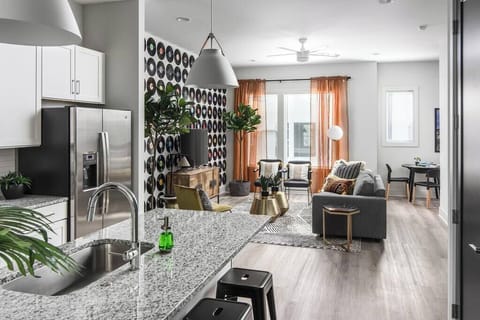 Open concept with kitchen flowing into the living room