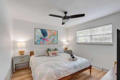 Bright and airy, with plenty of natural light you'll love snuggling up in our primary king bedroom. 