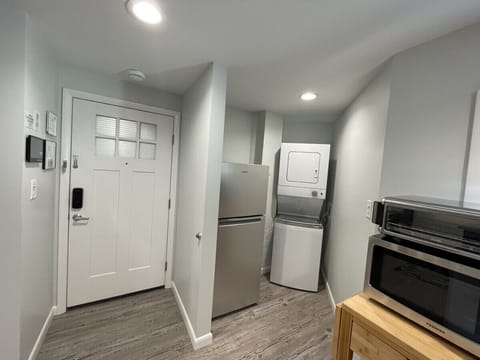 Entry Area w/ Refrigerator, Washer & Dryer
