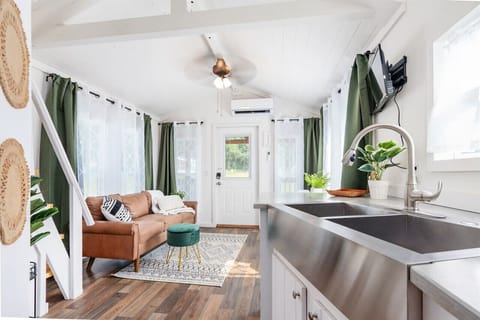 Stainless steel appliances, custom cabinets and countertops complete this well appointed kitchen