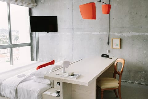 Work comfortably at a sun-washed desk beside the window.
