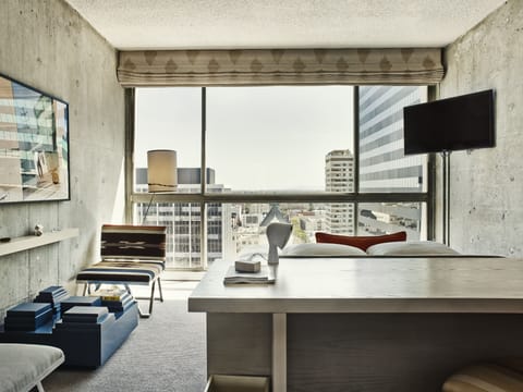 Settle in with a desk-side retreat and skyline views.