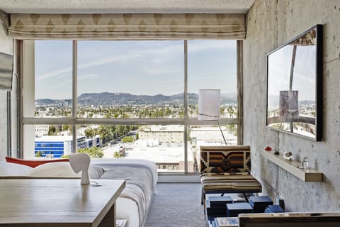 Wake up to sweeping mountain vistas from your bed.