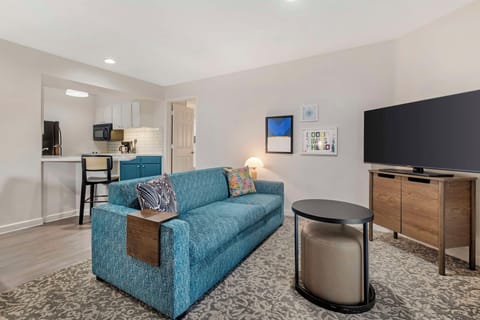 Stretch out on the plush sofa for movie nights.