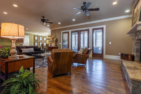 This is the main level living room.  A screened in patio with fireplace is just outside those doors!