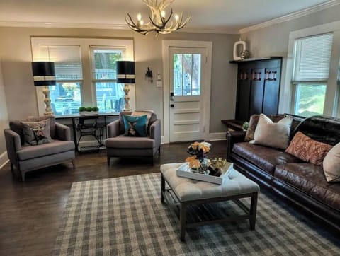 Cozy family room with warm fabrics + large leather (queen size) sleeper couch