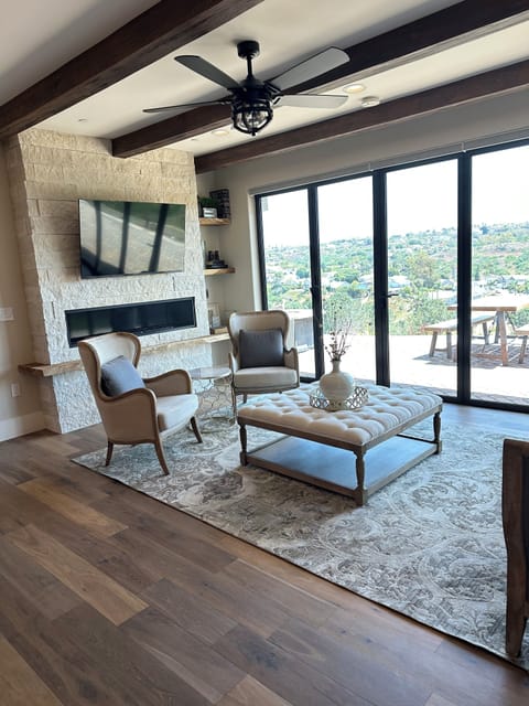 Living Room with Bifold Doors out to Private Patio