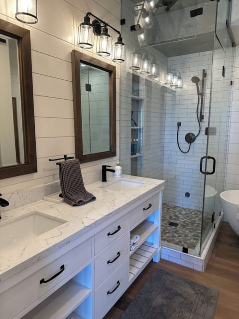 Master Bathroom with Dual Sinks and Steam Shower