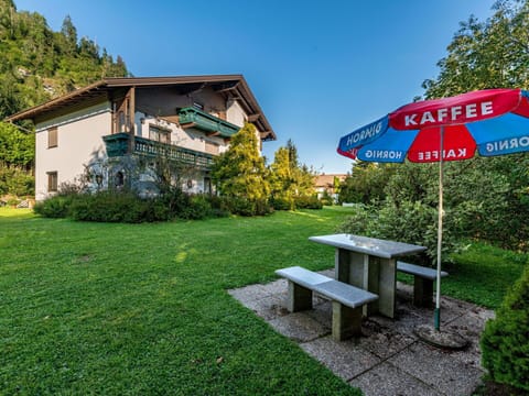 Plant, Property, Sky, Building, Nature, Natural Landscape, Outdoor Furniture, Tree, Shade, House