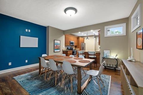 Dining room with carpet and well-matched furniture