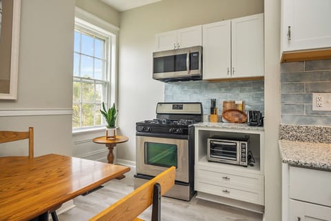 The kitchen is a wide and pleasant open concept, outfitted with all the necessities for your culinary needs.