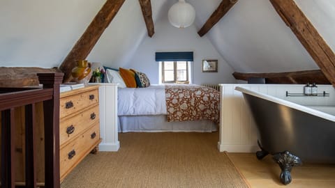 The top floor of Armada Cottage is home to the master suite.