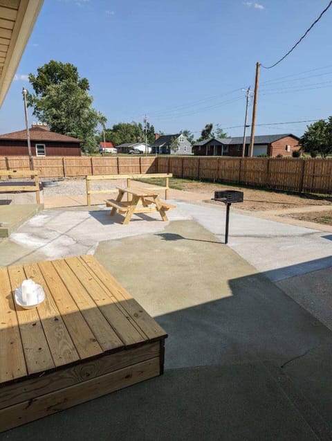 Sunny Patio with Grill & Picnic Table