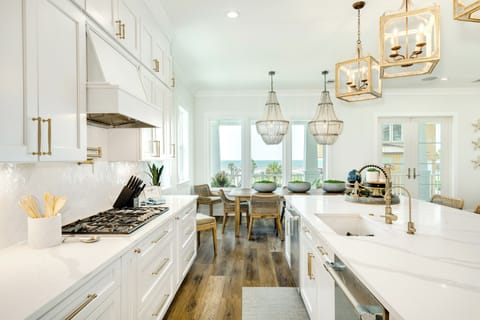 Fully equipped kitchen with granite counters and water views