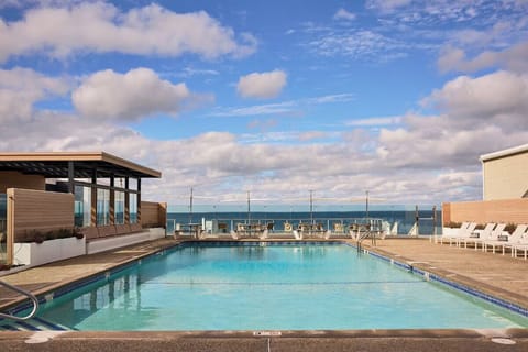 Dive into the sparkling pool with sweeping ocean views.