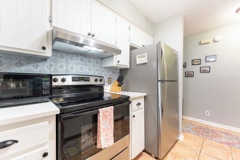 The fully stocked kitchen makes cooking quick and easy.