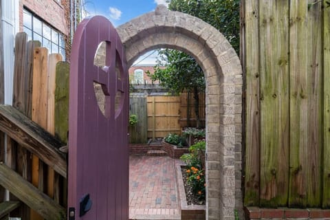 A corridor next to Monkees boutique will lead you to this gate