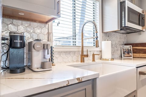 Fully Equipped Kitchen – Modern appliances and a coffee station to start your day right.