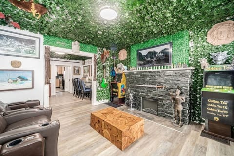 Your living room includes three theater recliners, an electric fireplace, board games, and arcades