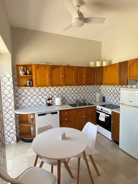 Fully stocked eat in Kitchen includes DW and free standing oven.