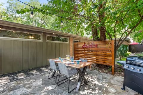 Outdoor patio with a grill