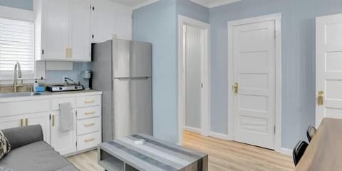 Cozy living space with a sofa sleeper (this is located in the kitchen)